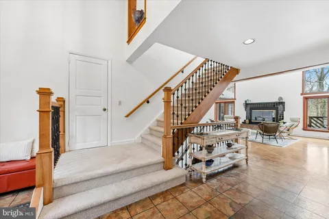 a view of entryway livingroom and hall