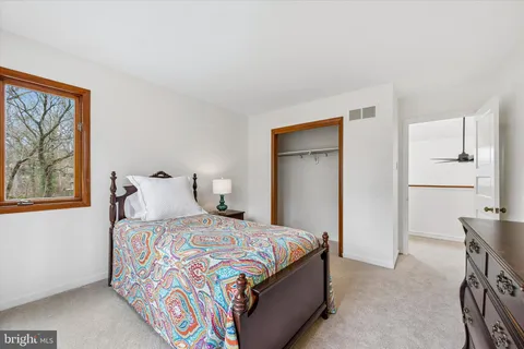 a view of street with parked cars