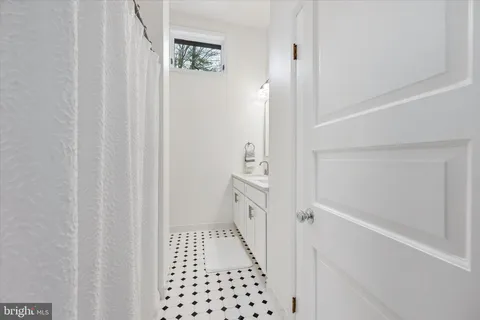 a view of a car parked in front of a building