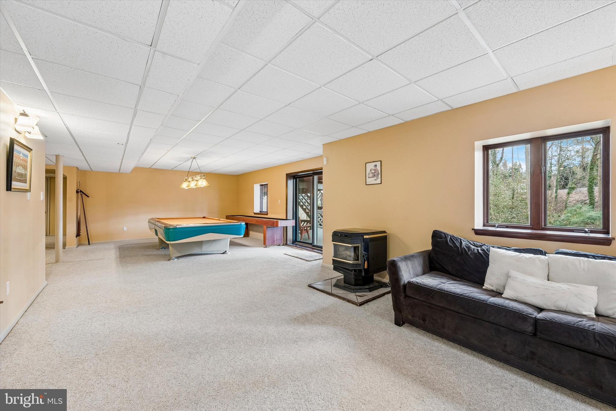 2 Lake Avenue Wallingford, PA 19086 - Photo 39 of 60 a living room with furniture and a window