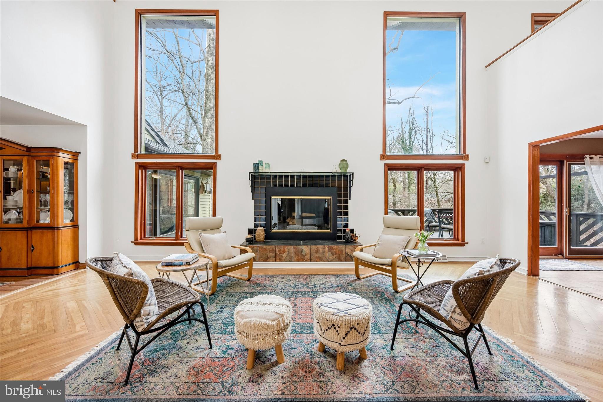 2 Lake Avenue Wallingford, PA 19086 - Photo 6 of 60 a living room with furniture a wooden floor and next to a window