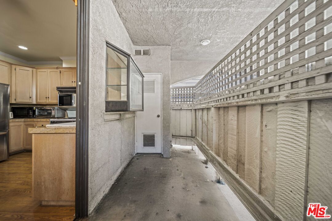 5400 Simpson Avenue, Unit 9 Valley Village, CA 91607 - Photo 13 of 30 a view of a kitchen with a refrigerator