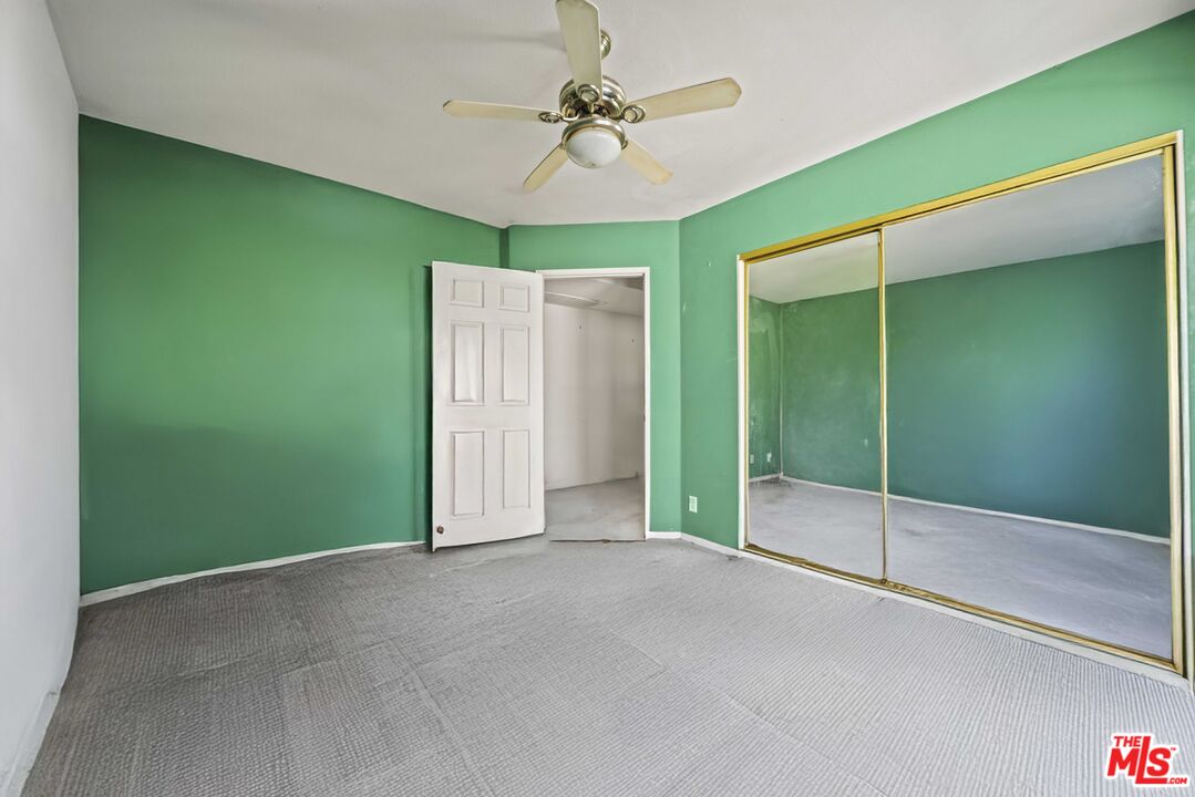 5400 Simpson Avenue, Unit 9 Valley Village, CA 91607 - Photo 16 of 30 a view of an empty room with a fan