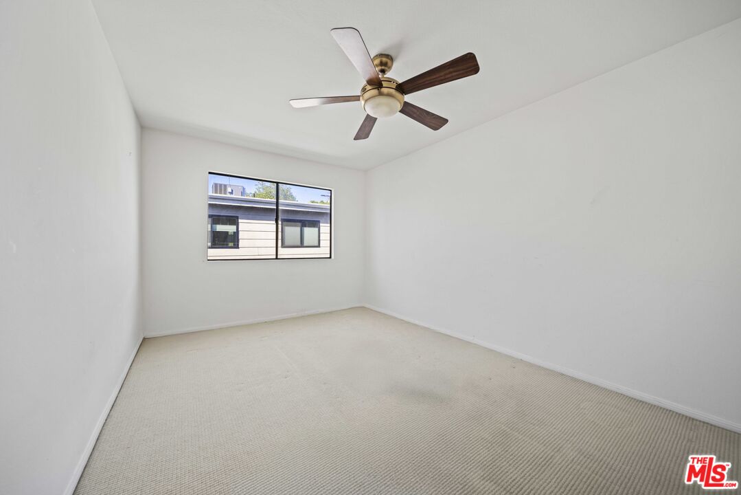 5400 Simpson Avenue, Unit 9 Valley Village, CA 91607 - Photo 19 of 30 an empty room with window and windows