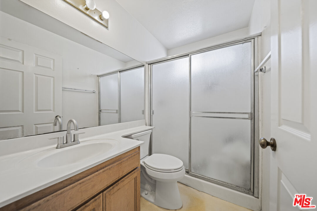 5400 Simpson Avenue, Unit 9 Valley Village, CA 91607 - Photo 21 of 30 a bathroom with a sink toilet and shower