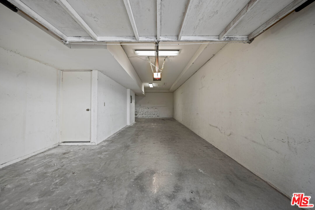 5400 Simpson Avenue, Unit 9 Valley Village, CA 91607 - Photo 28 of 30 a view of hallway with a ceiling fan