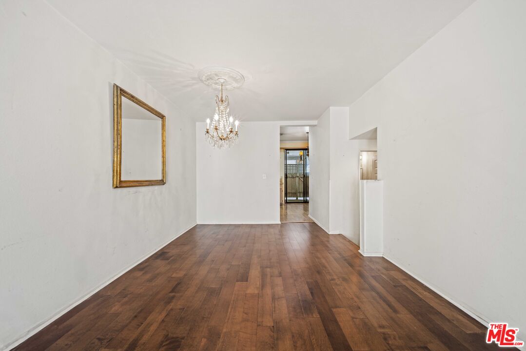 5400 Simpson Avenue, Unit 9 Valley Village, CA 91607 - Photo 7 of 30 wooden floor in an empty room with a window