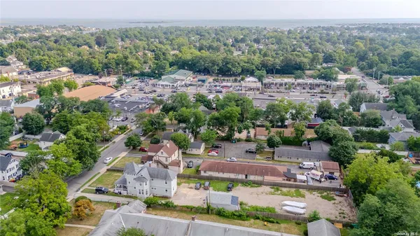 an aerial view of a house with a garden