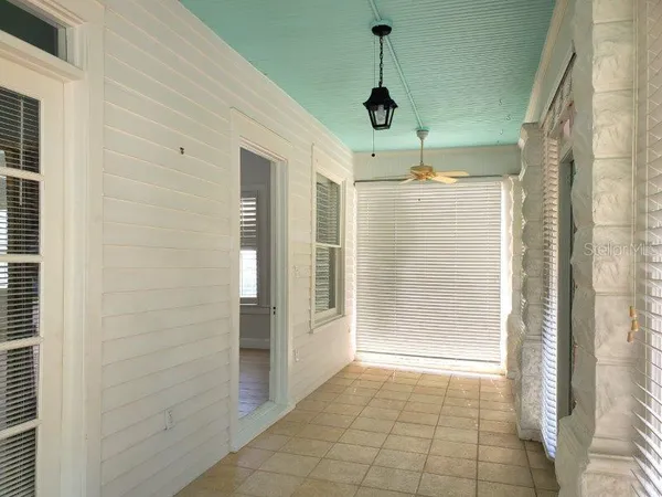 a view of a hallway with a shower