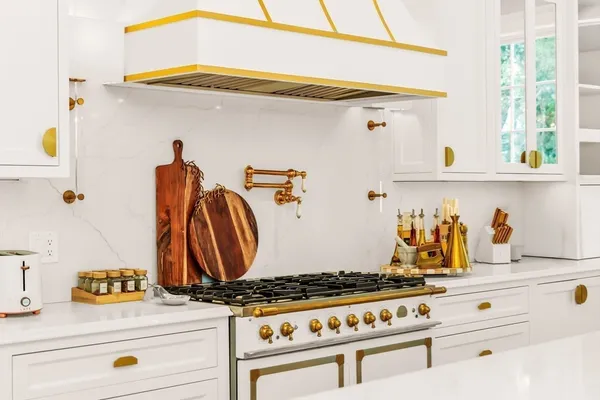 a spacious bedroom with a large bed and a fireplace