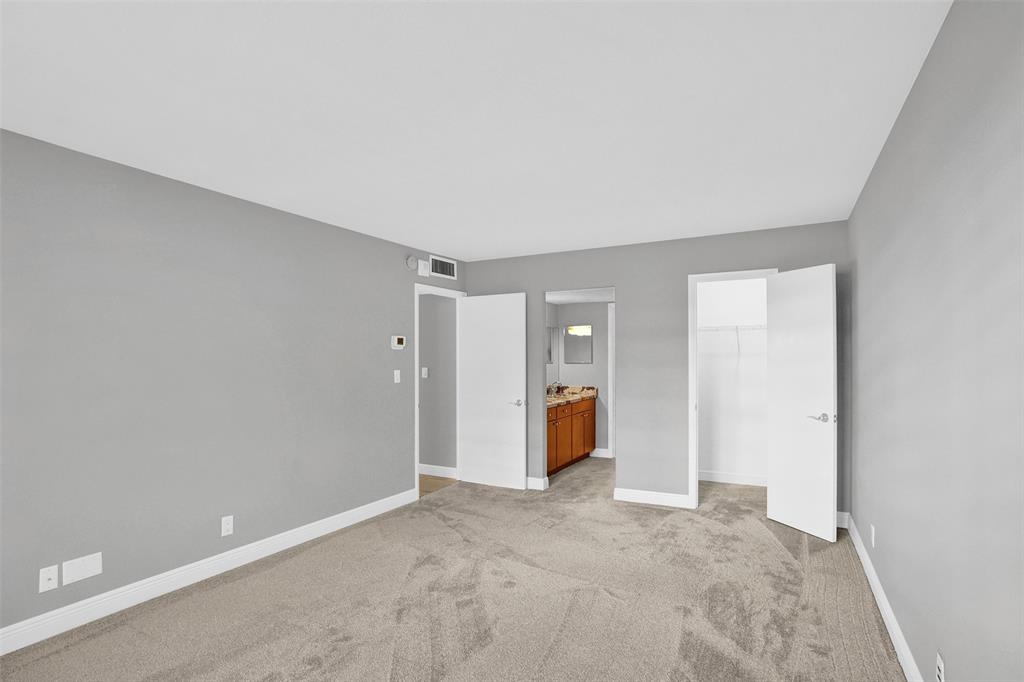 1900 South Ocean Boulevard, Unit 2F Lauderdale-by-the-Sea, FL 33062 - Photo 14 of 34 an empty room with an empty space and windows