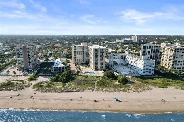 an aerial view of residential building and city view