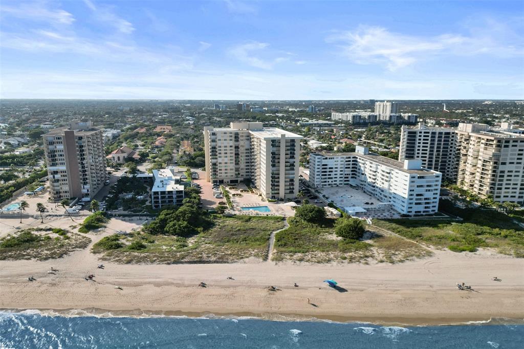 1900 South Ocean Boulevard, Unit 2F Lauderdale-by-the-Sea, FL 33062 - Photo 2 of 34 an aerial view of residential building and city view