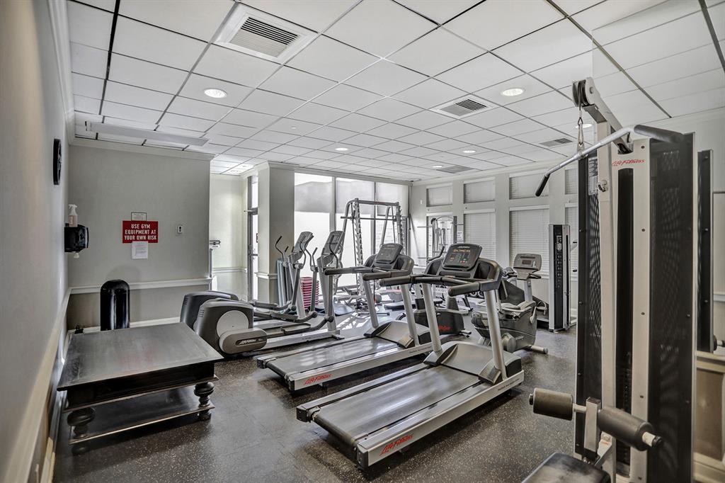 1900 South Ocean Boulevard, Unit 2F Lauderdale-by-the-Sea, FL 33062 - Photo 28 of 34 a view of a room with gym equipment