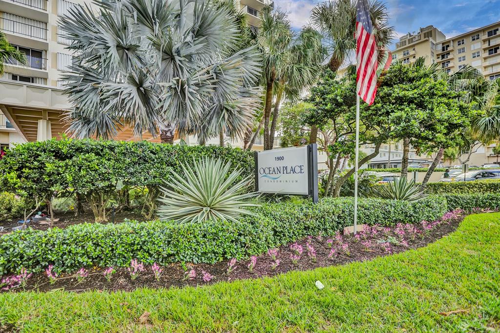 1900 South Ocean Boulevard, Unit 2F Lauderdale-by-the-Sea, FL 33062 - Photo 3 of 34 a sign of golf club on a wall under a tree