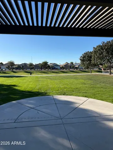 a view of a golf course with a lake