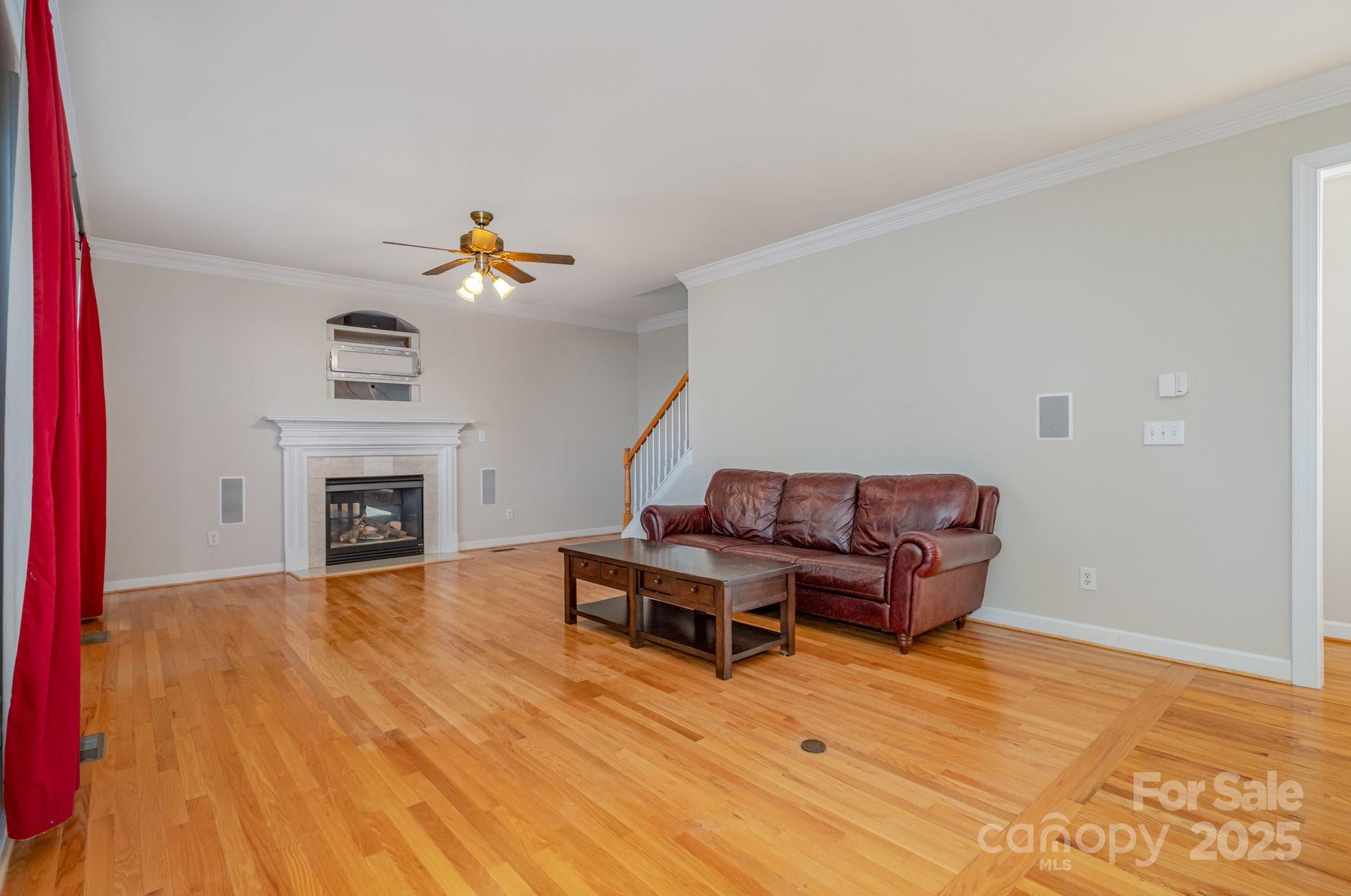 1930 Copperplate Road Charlotte, NC 28262 - Photo 18 of 43 a living room with furniture and a fireplace