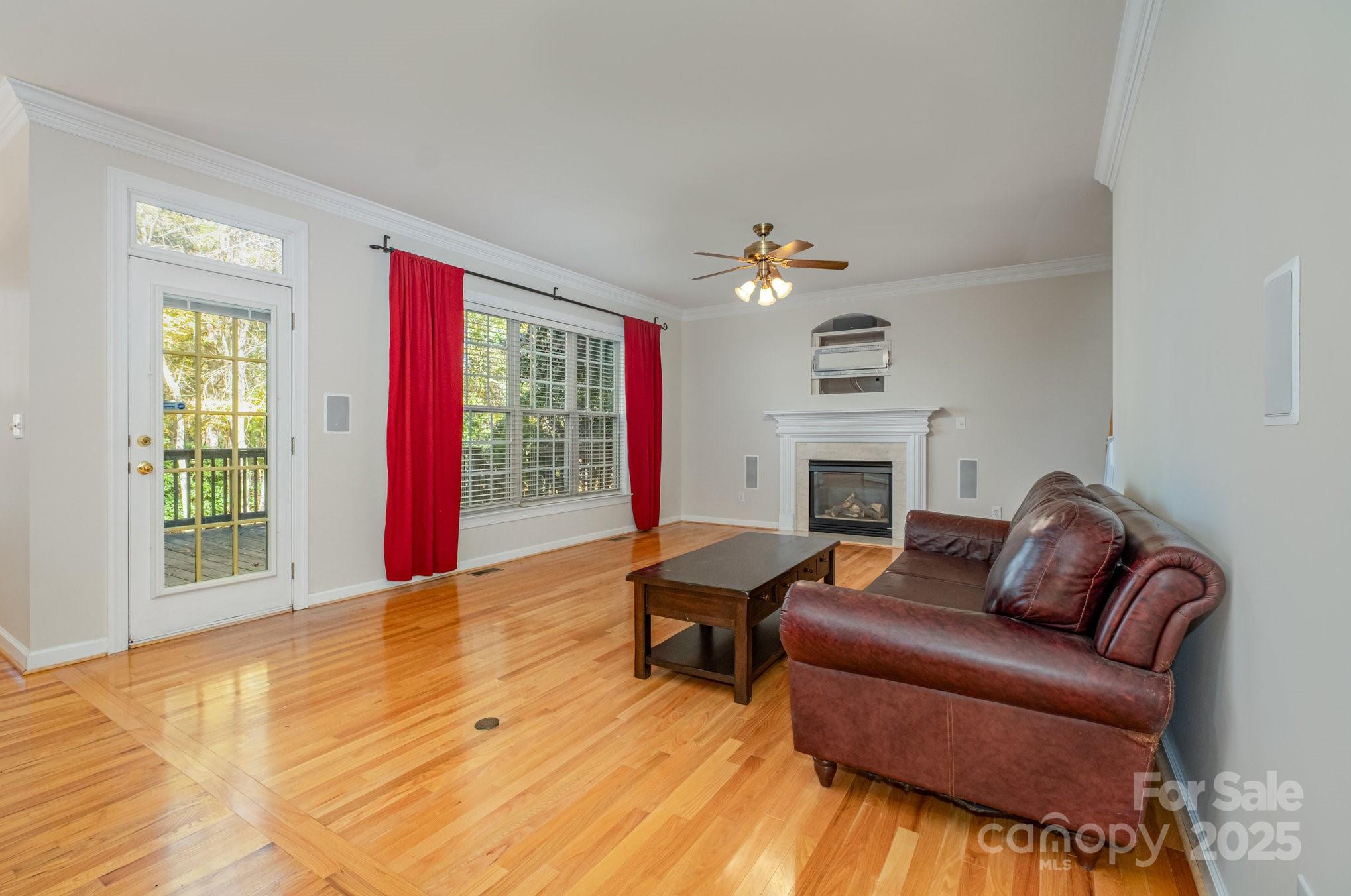 1930 Copperplate Road Charlotte, NC 28262 - Photo 19 of 43 a living room with furniture fireplace and a window