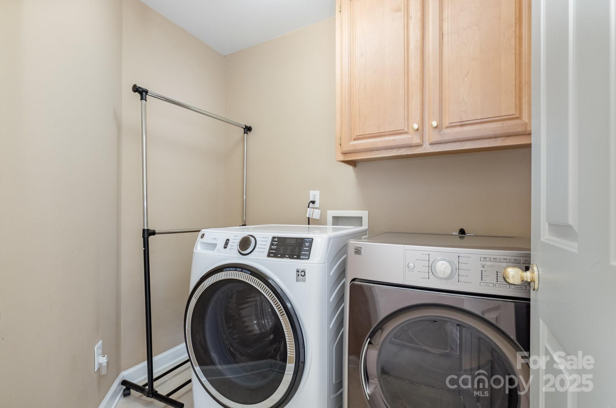 1930 Copperplate Road Charlotte, NC 28262 - Photo 28 of 43 a utility room with dryer and washer
