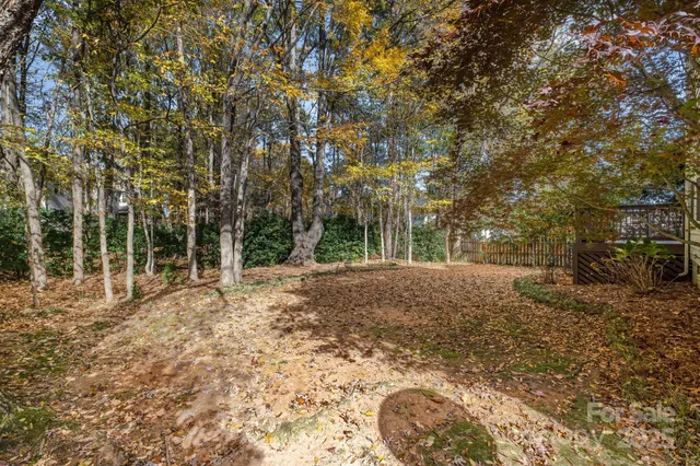 a view of a balcony with wooden floor