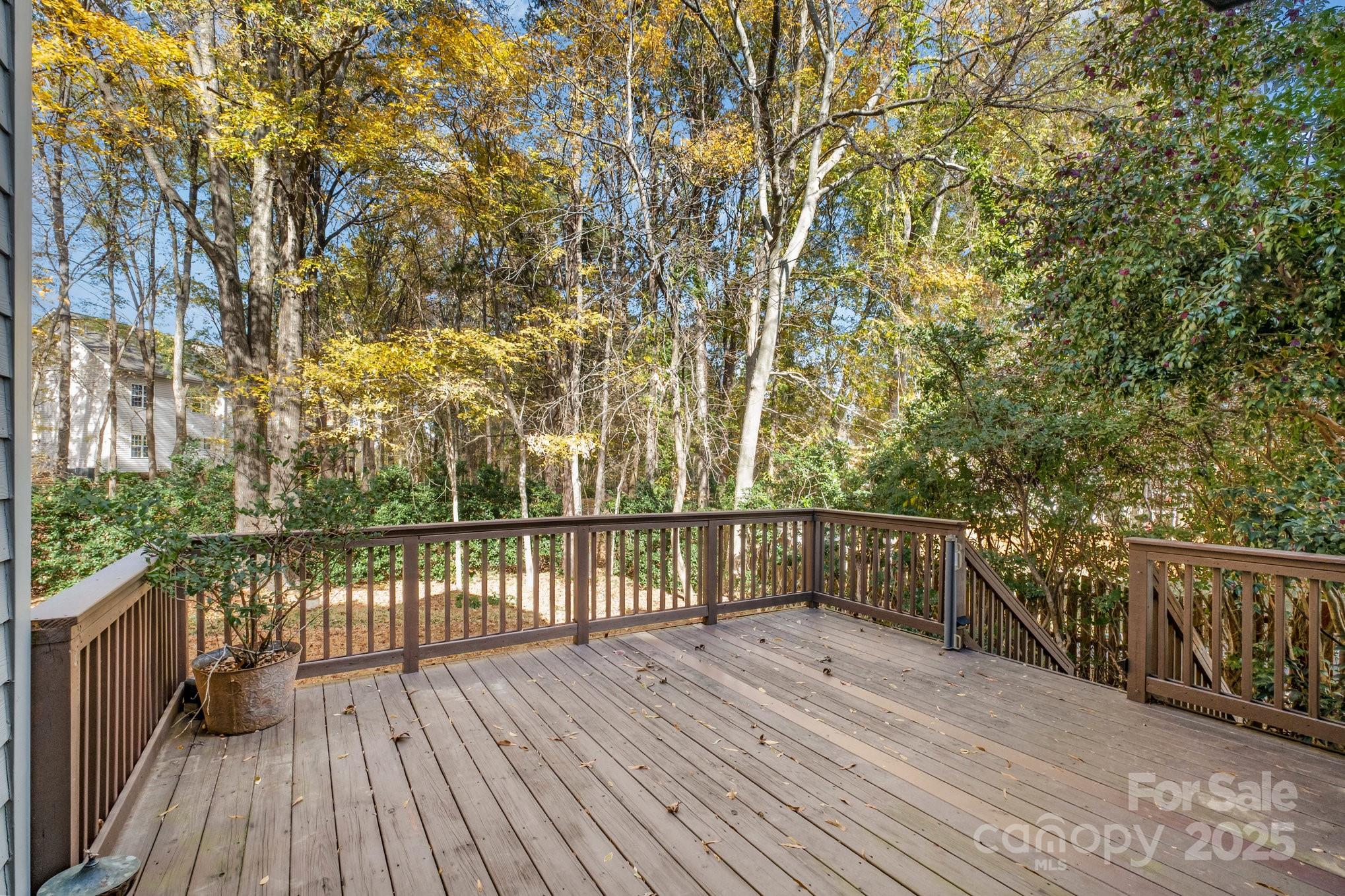 1930 Copperplate Road Charlotte, NC 28262 - Photo 36 of 43 a view of balcony with wooden floor and fence