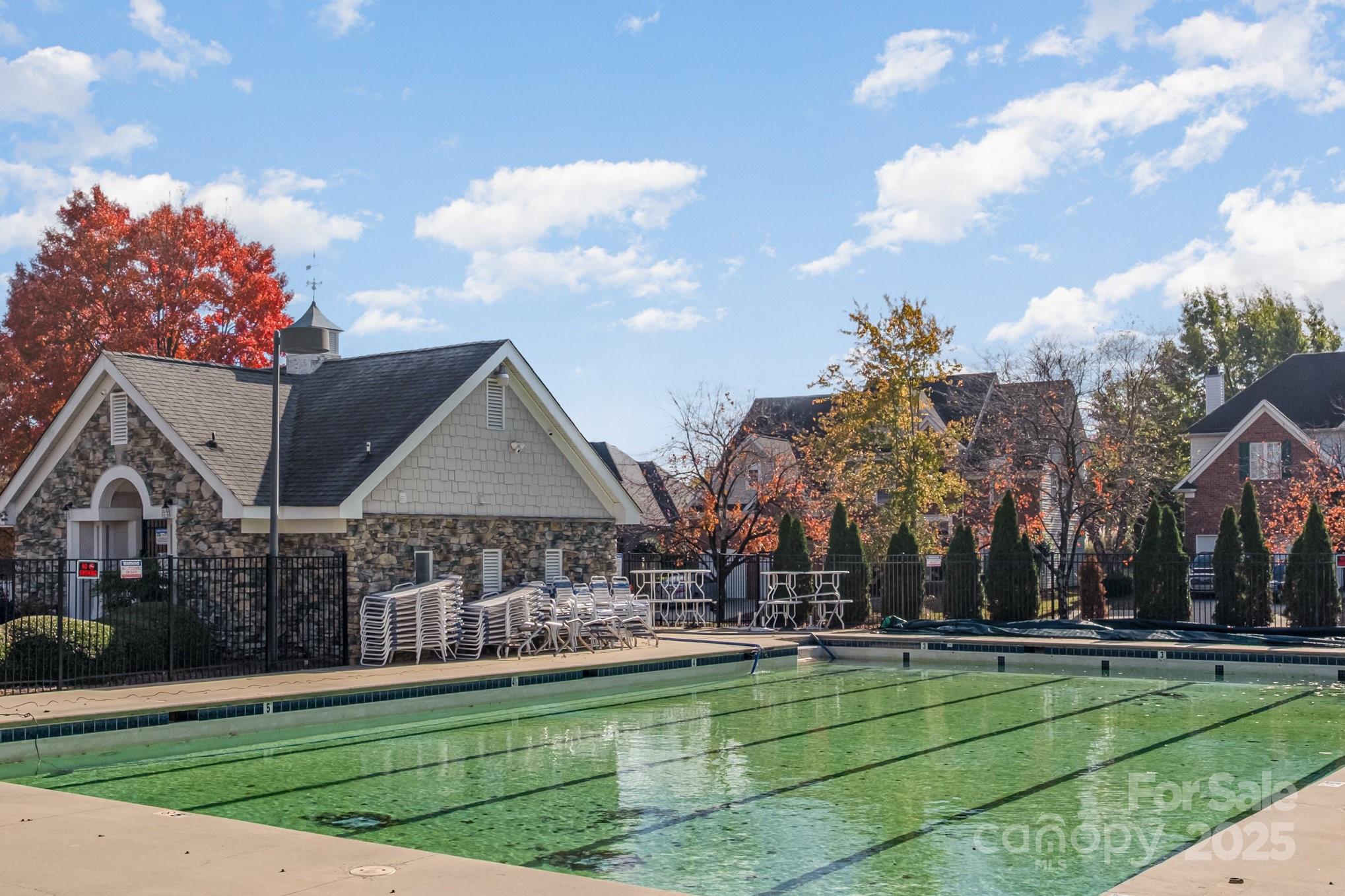 1930 Copperplate Road Charlotte, NC 28262 - Photo 39 of 43 a front view of a house with a garden and trees