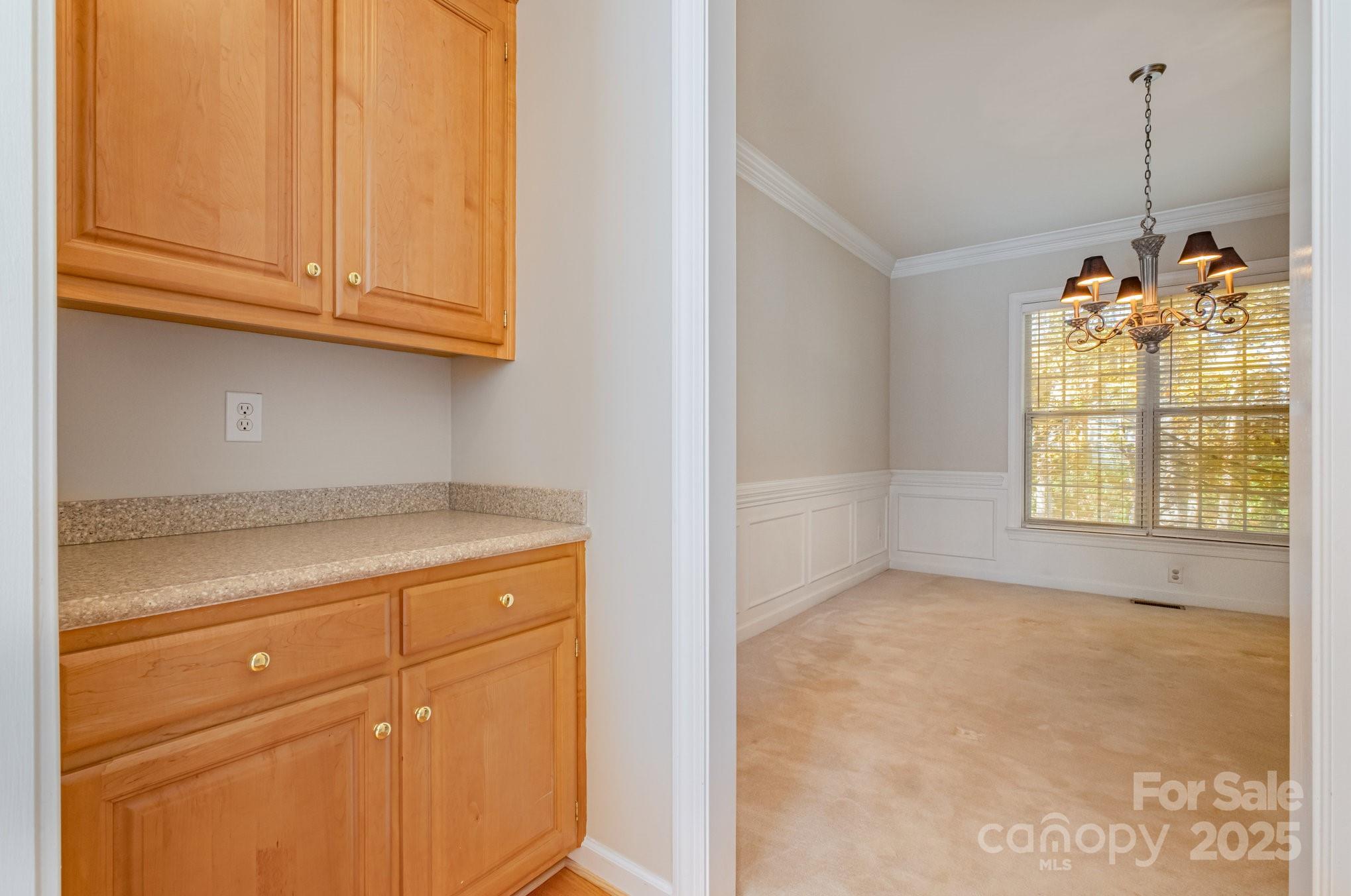 1930 Copperplate Road Charlotte, NC 28262 - Photo 8 of 43 a view of a storage and utility room with window