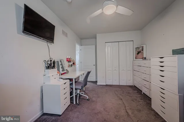 a view of a livingroom with furniture