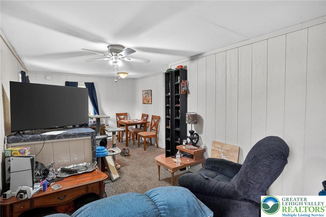 357 Main Road Lehighton, PA 18235 - Photo 29 of 38 a living room with furniture and a flat screen tv