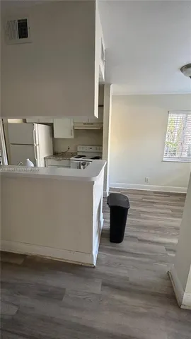 $1,700 | 5686 Rock Island Road, Unit 107, Tamarac, FL 33319