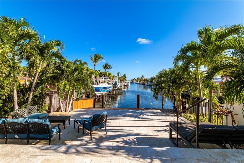 2948 Northeast 35th Court Lighthouse Point, FL 33064 - Photo 21 of 24 a view of a terrace with seating area