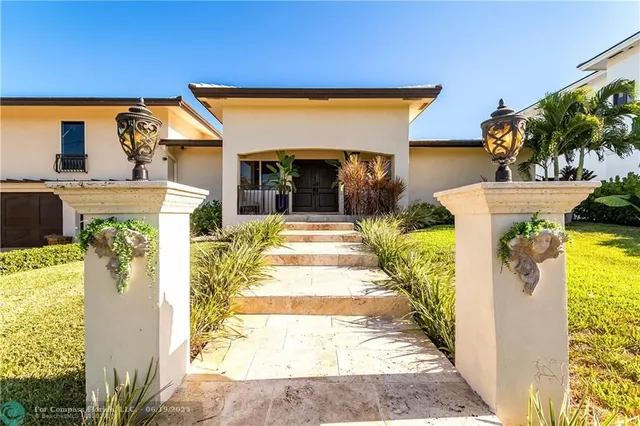 a view of swimming pool with a patio