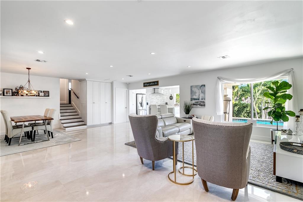 2948 Northeast 35th Court Lighthouse Point, FL 33064 - Photo 5 of 24 a view of a dining room with furniture window and outside view