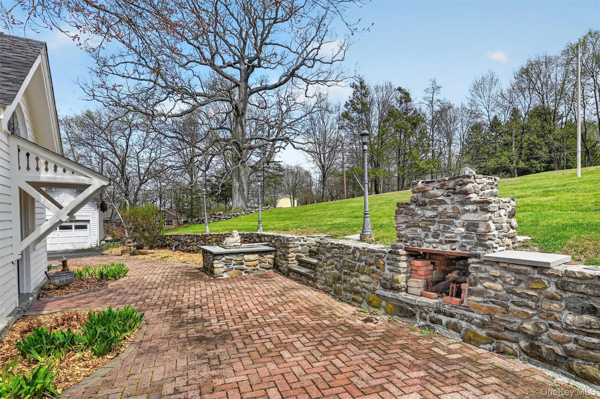 12 Perry Creek Road Washingtonville, NY 10992 - Photo 38 of 48 a view of a park with sitting area and fire pit