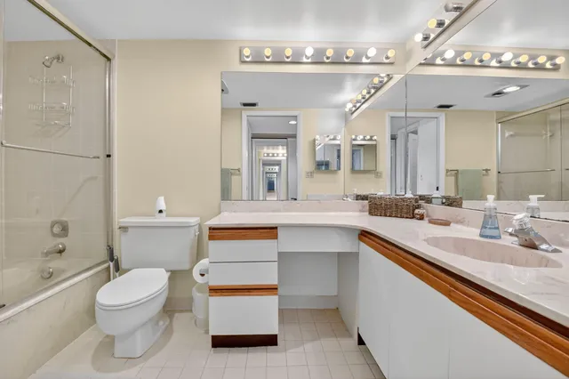 a bathroom with a toilet a sink and a bathtub