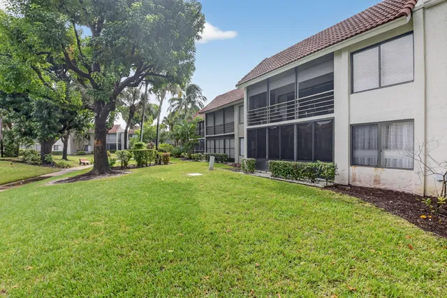 a view of a back yard of the house