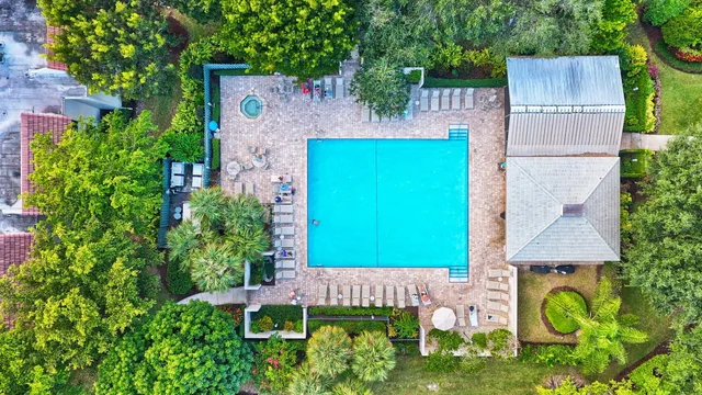 an aerial view of a house with a garden