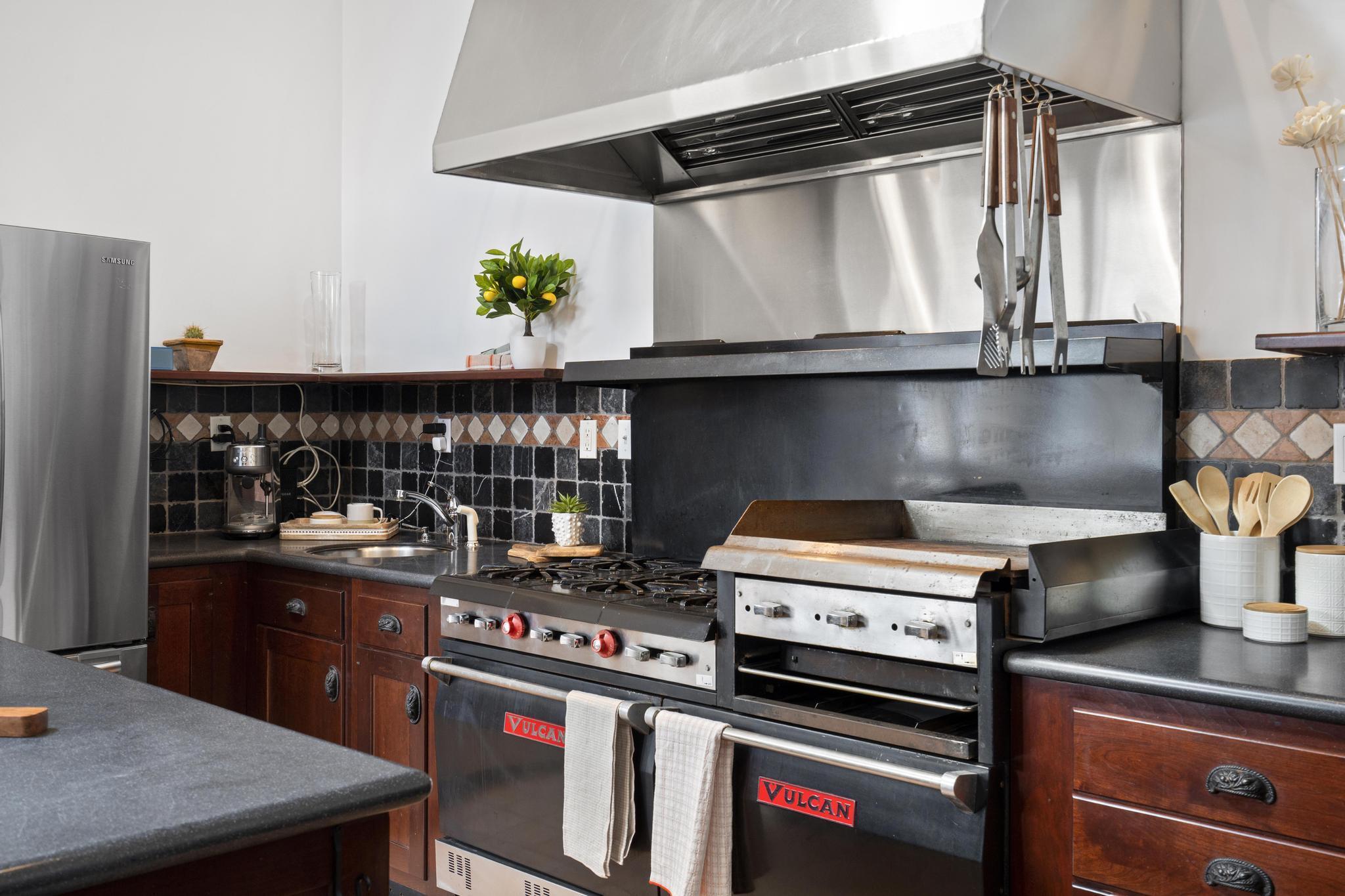381 West Mountain Road Ridgefield, CT 06877 - Photo 11 of 35 a kitchen with a stove and a cabinets