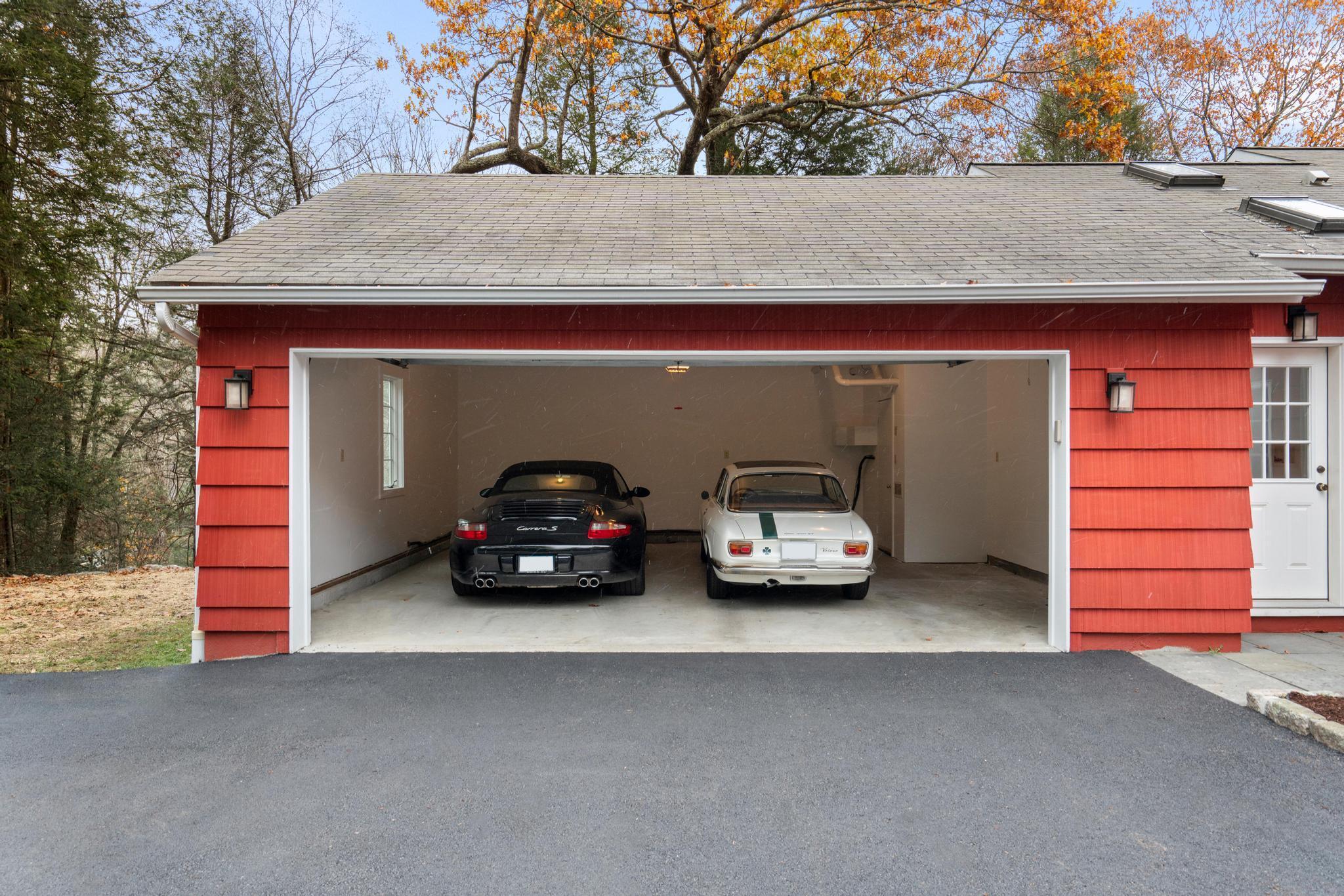 381 West Mountain Road Ridgefield, CT 06877 - Photo 35 of 35 a view of a car parked in back of a house