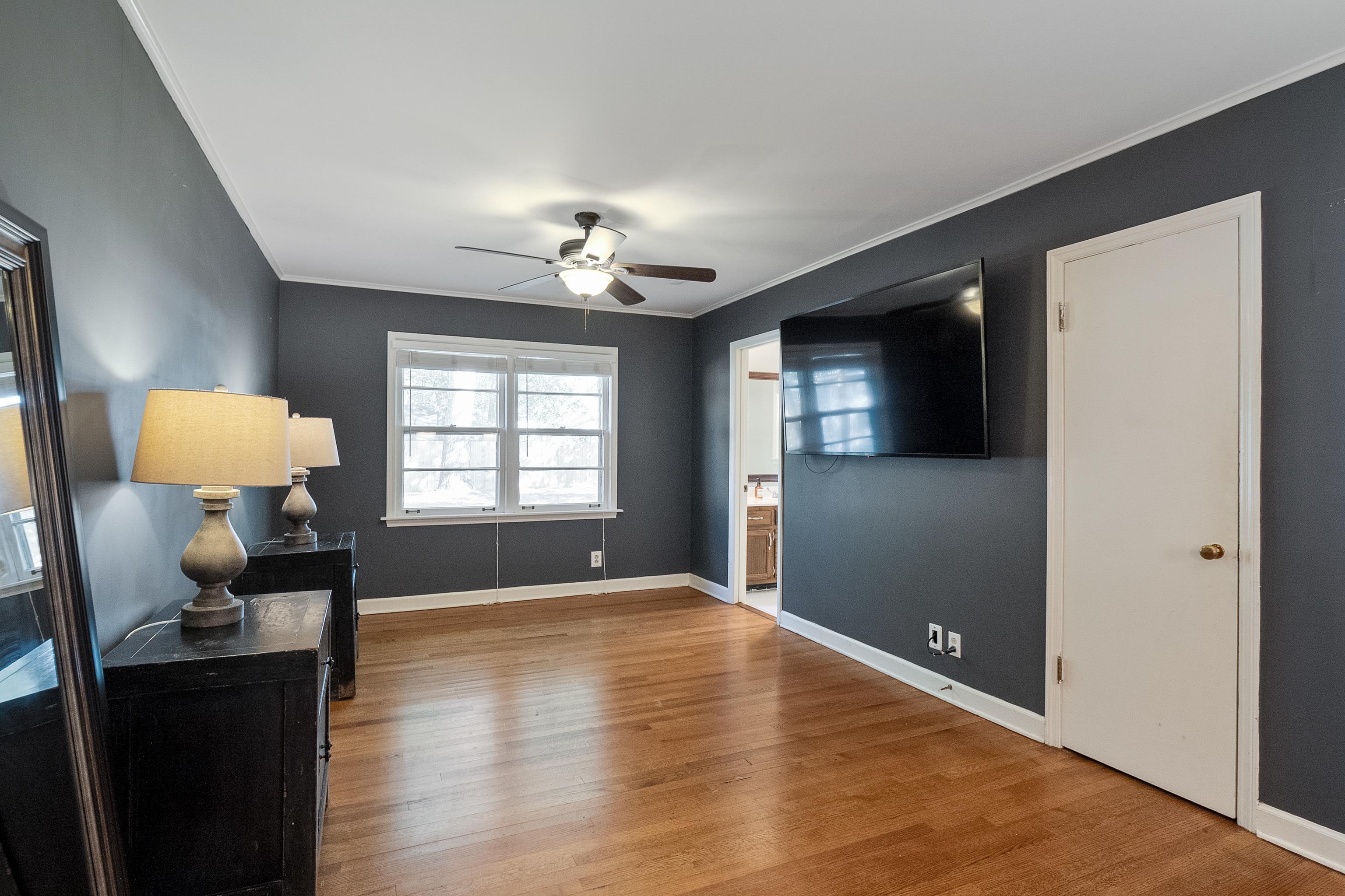 1216 West Perkins Road Memphis, TN 38117 - Photo 18 of 30 a view of livingroom with furniture window and wooden floor