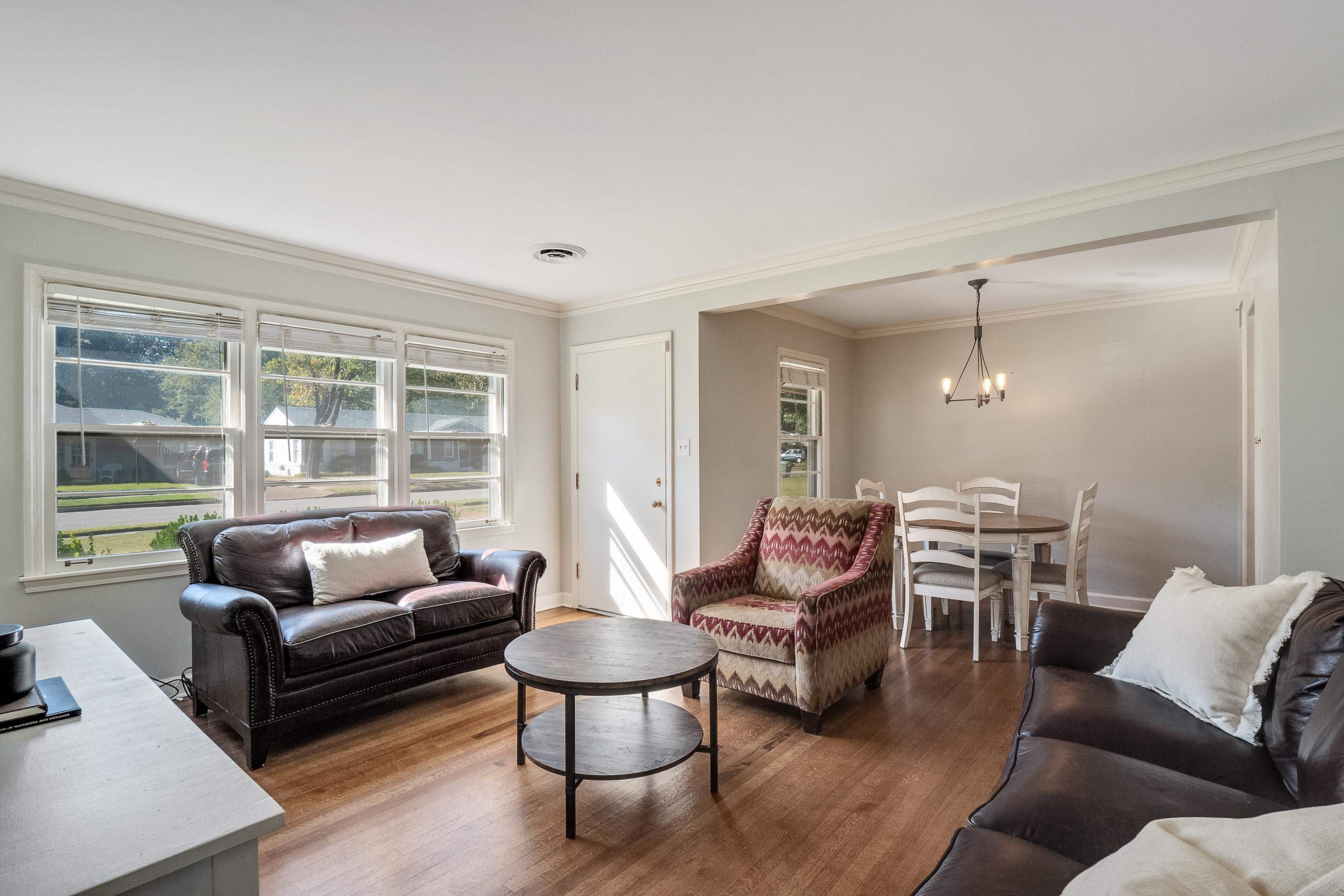 1216 West Perkins Road Memphis, TN 38117 - Photo 5 of 30 a living room with furniture and a large window