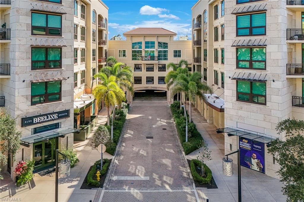 9123 Strada Place, Unit 7201 Naples, FL 34108 - Photo 1 of 50 a front view of a building with street view