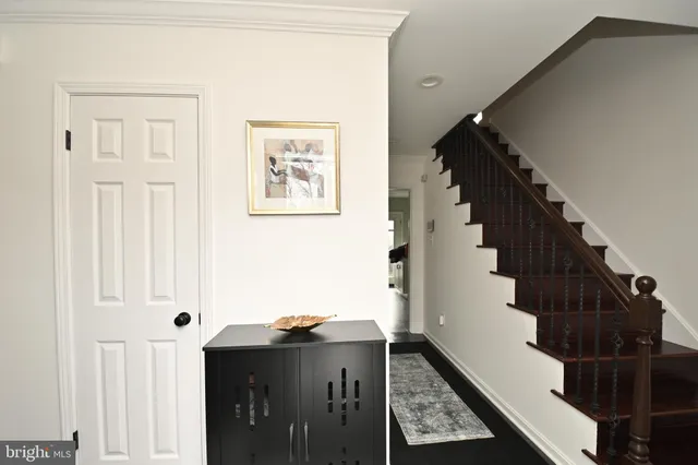 a view of entryway with wooden floor