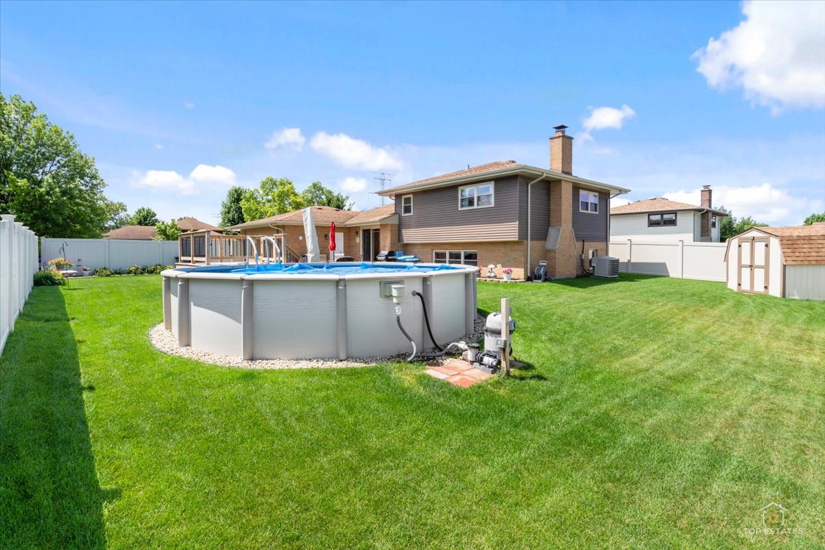 8124 Nottingham Road Tinley Park, IL 60477 - Photo 28 of 33 a view of a house with a yard