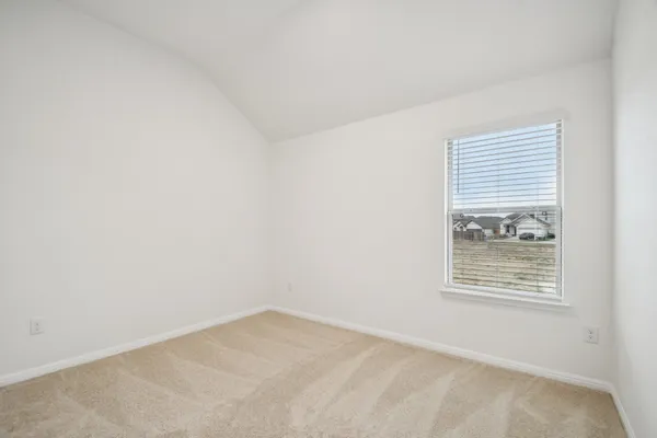 a view of a back yard of the house