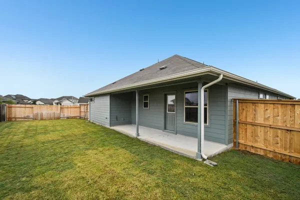 a view of a swimming pool with a garden
