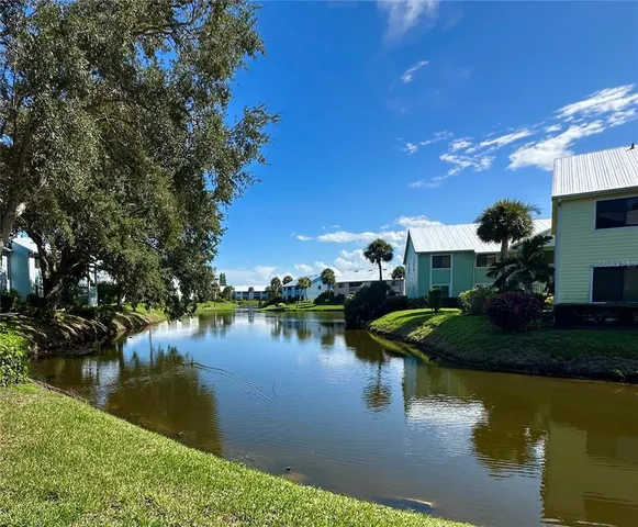 a view of a lake with houses