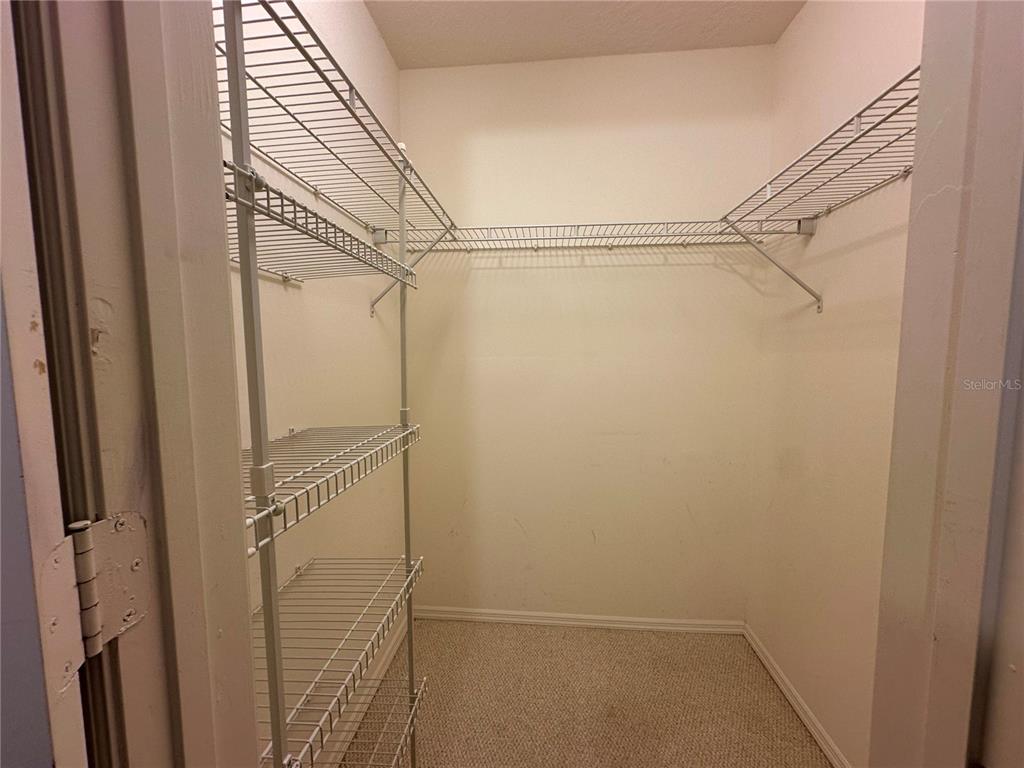 5685 Marina Drive, Unit 4 Sebastian, FL 32958 - Photo 8 of 19 a bathroom with a glass shower door