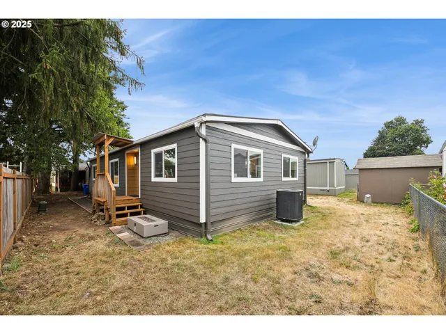 a house view with a backyard space