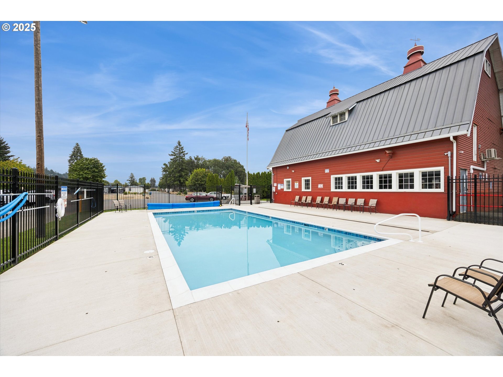 10701 Southeast Highway 212, Unit P6 Clackamas, OR 97015 - Photo 35 of 42 a view of a swimming pool with an outdoor seating